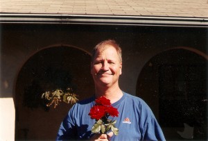 Dallin Malmgren holds roses in 2004.