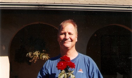 Dallin Malmgren holds roses in 2004.